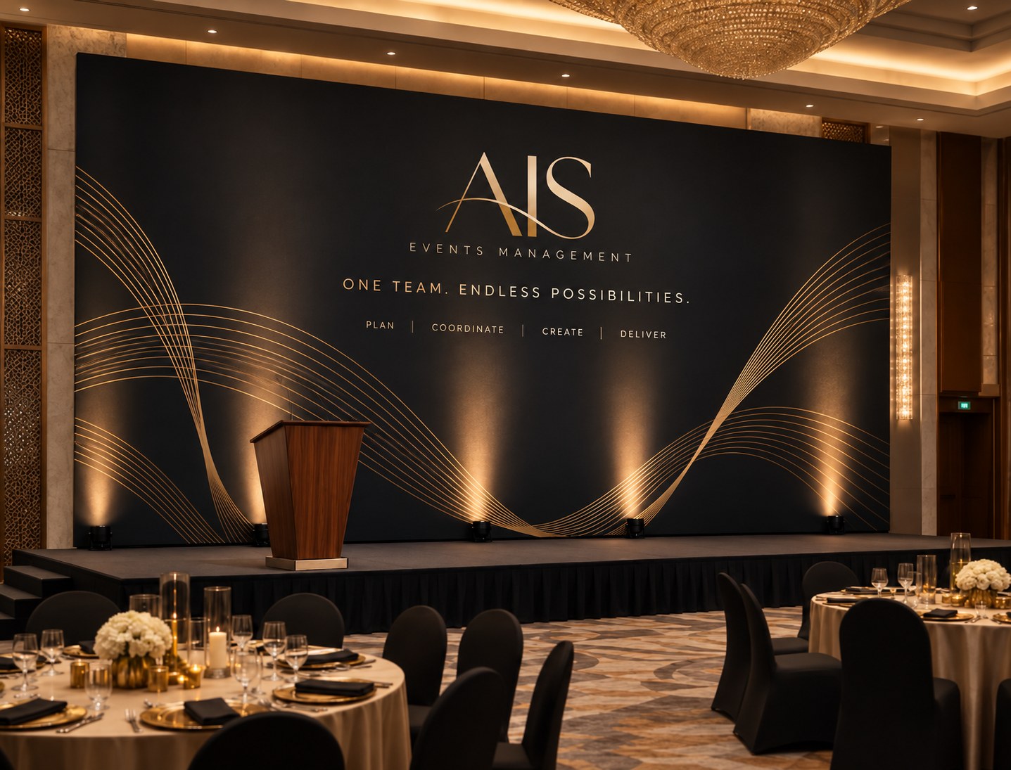 AIS branded stage backdrop and banquet setup in a UAE ballroom